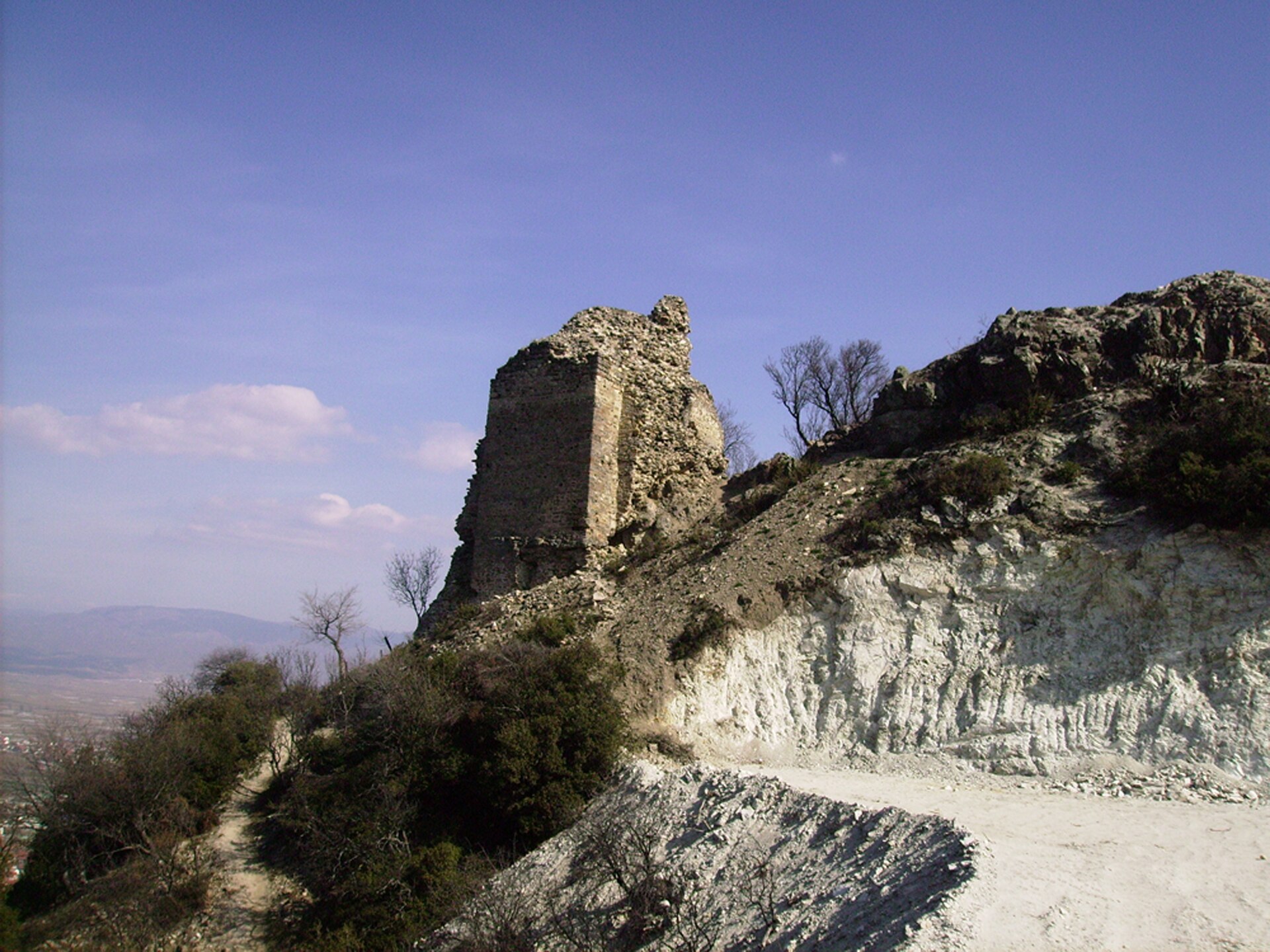 Stone tower remains on the rocky hillside at Carevi Kuli.
